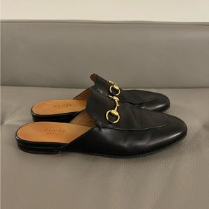 Gucci Black Leather Mules with Gold Accents